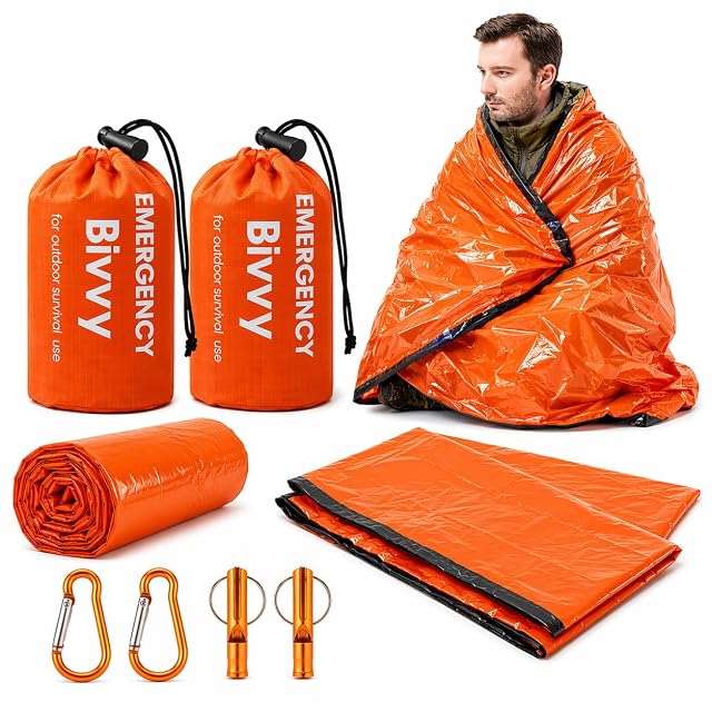 Sursac de survie orange en Mylar HappyDaily avec sa pochette à cordon, son sifflet et son mousqueton