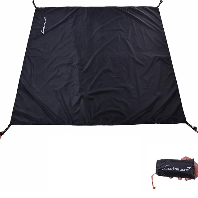 Tapis de sol imperméable gris Clostnature étalé sous une tente de camping